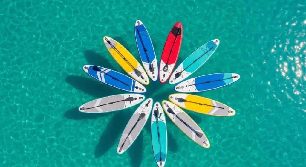 Close-up of stable inflatable SUP board floating on lake water